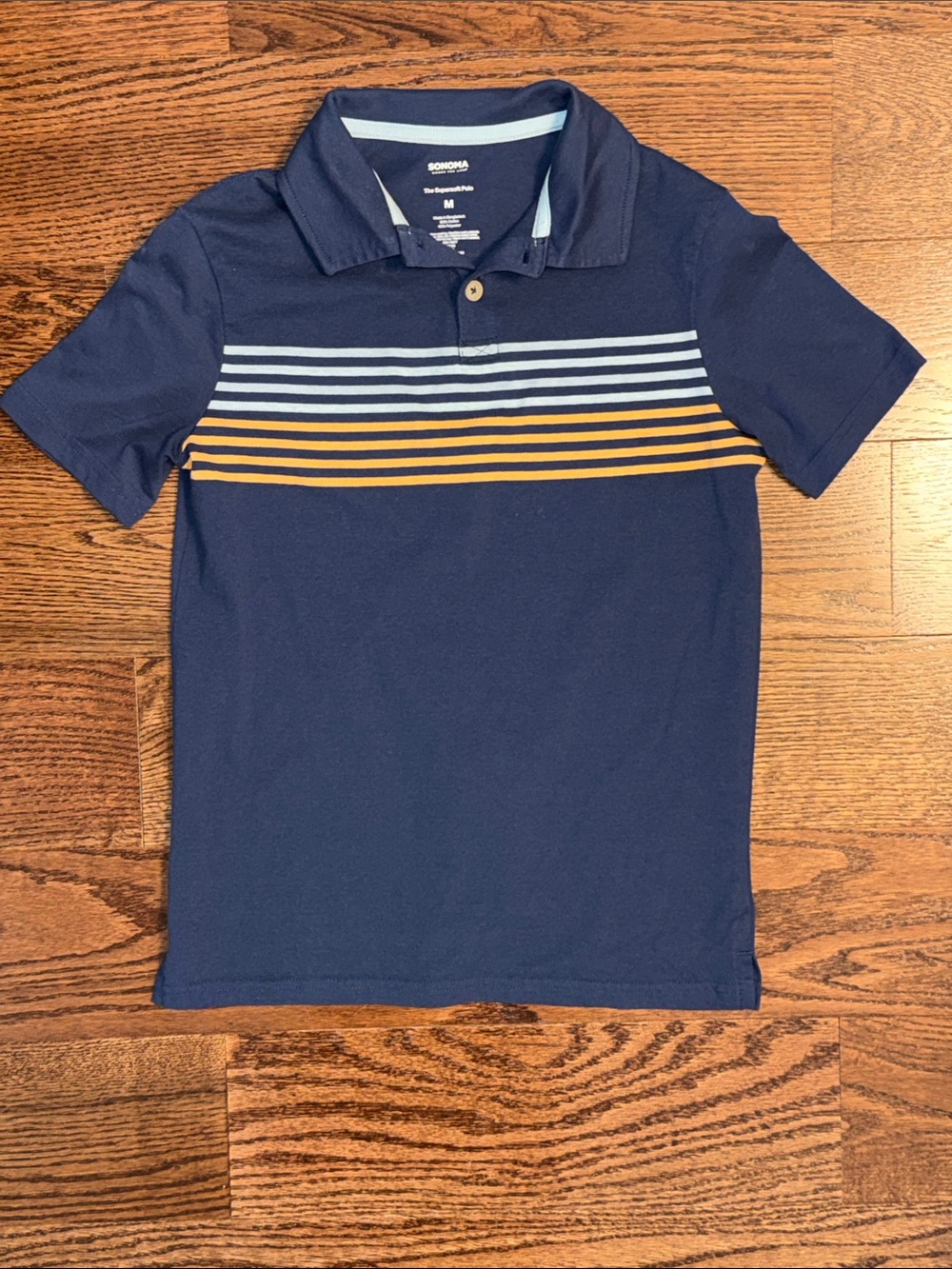 Boys size M/10-12 Sonoma super soft short sleeve polo shirt . Navy with stripes.